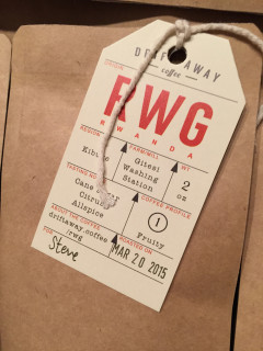 Tag on the Rwandan coffee, outlining country and region of origin, tasting notes, roast date, and more