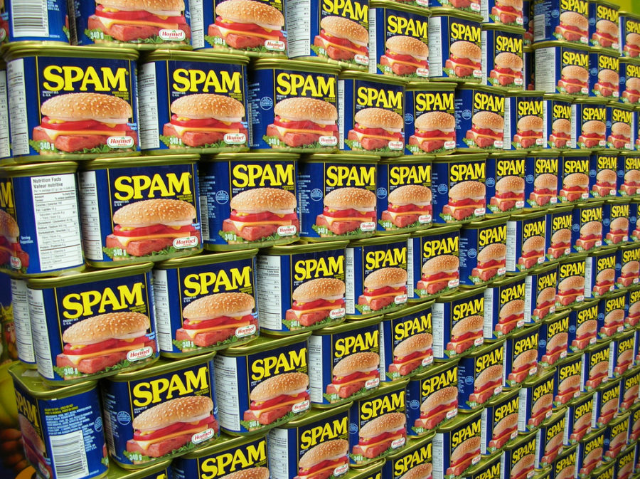 A wall filled with cans of spam.