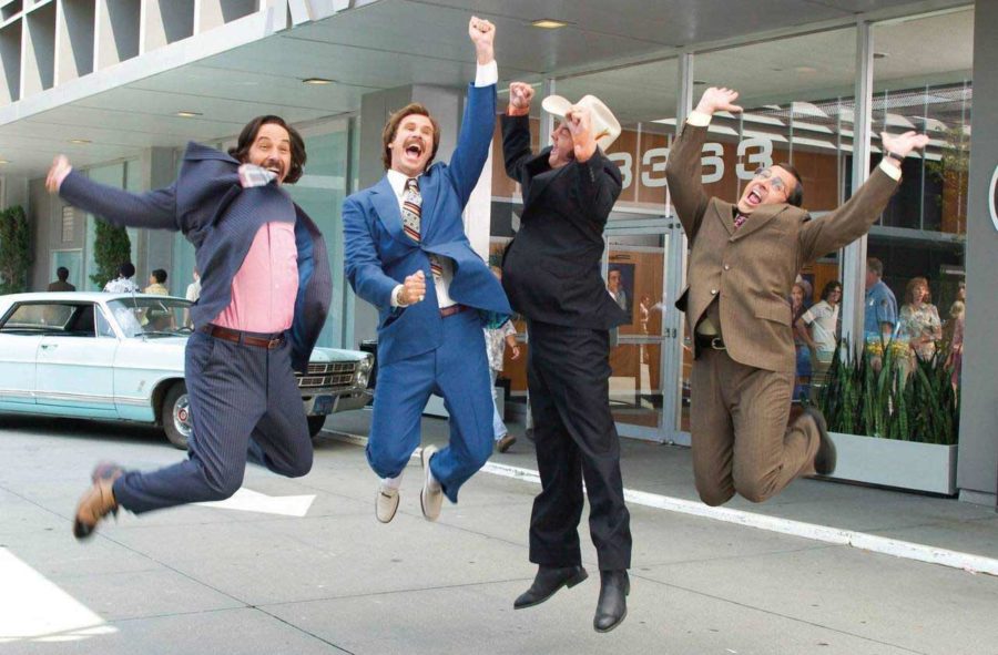 Ron Burgundy and the Channel 4 News Team (from the film Anchorman: The Legend of Ron Burgundy) jumping into the air