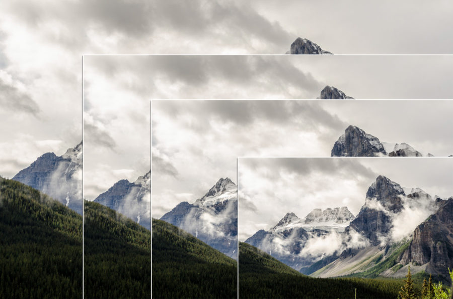 A photo of a mountain with increasingly smaller copies of the same image overlaid on top.