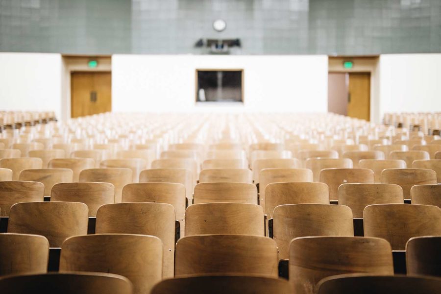 An empty, auditorium-style lecture hall